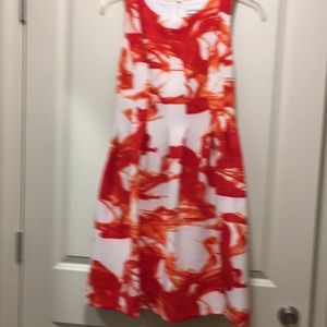 Beautiful women dress , sleeveless and round neck( no collar).  Size 12